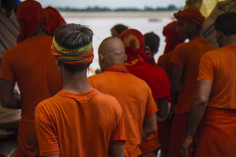 Photograph by Jeff Hann: Pilgrams in Varanasi